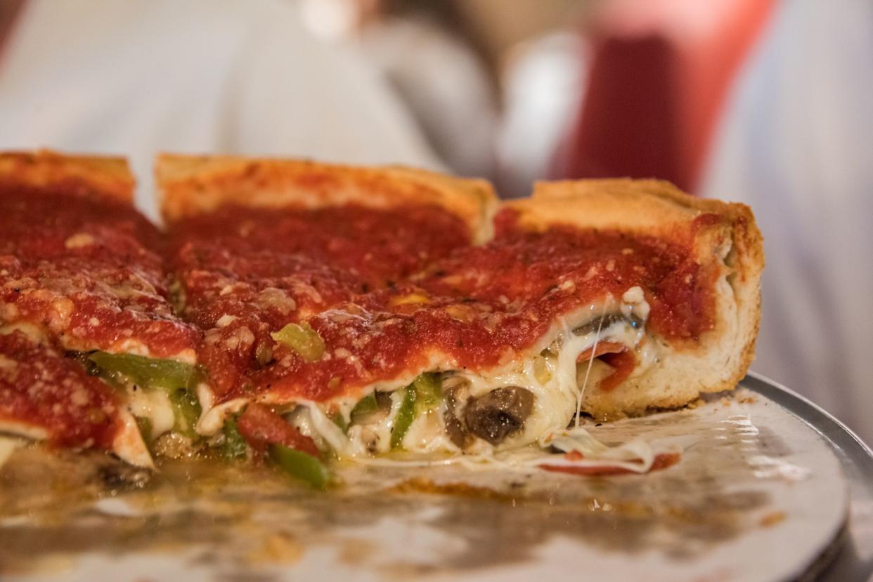 Sideview of a Sliced Chicago-Style Deep Dish Pizza, Selective Focus