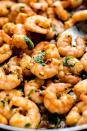 <p>Dinner has never been easier! This slightly spicy and madly flavourful garlic coriander <a href="https://www.delish.com/uk/cooking/recipes/g32331046/prawn-recipes/" rel="nofollow noopener" target="_blank" data-ylk="slk:prawns;elm:context_link;itc:0;sec:content-canvas" class="link ">prawns</a> dish comes together in minutes.</p><p>Get the <a href="https://www.delish.com/uk/cooking/recipes/a33466387/garlic-cilantro-shrimp-recipe/" rel="nofollow noopener" target="_blank" data-ylk="slk:Garlic Coriander Prawns;elm:context_link;itc:0;sec:content-canvas" class="link ">Garlic Coriander Prawns</a> recipe</p>