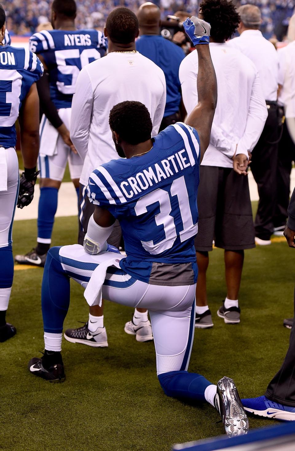<p>Antonio Cromartie #31 of the Indianapolis Colts kneels and raises his fist during the National Anthem before the game against the San Diego Chargers at Lucas Oil Stadium on September 25, 2016 in Indianapolis, Indiana. (Photo by Stacy Revere/Getty Images) </p>
