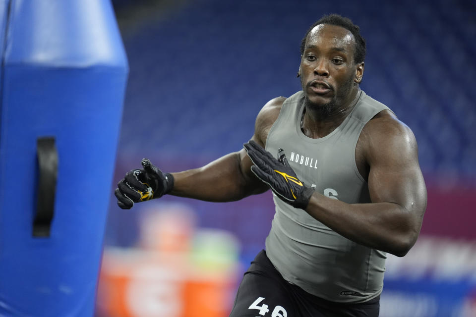 Missouri defensive lineman Darius Robinson runs a drill at the NFL football scouting combine, Thursday, Feb. 29, 2024, in Indianapolis. (AP Photo/Michael Conroy)