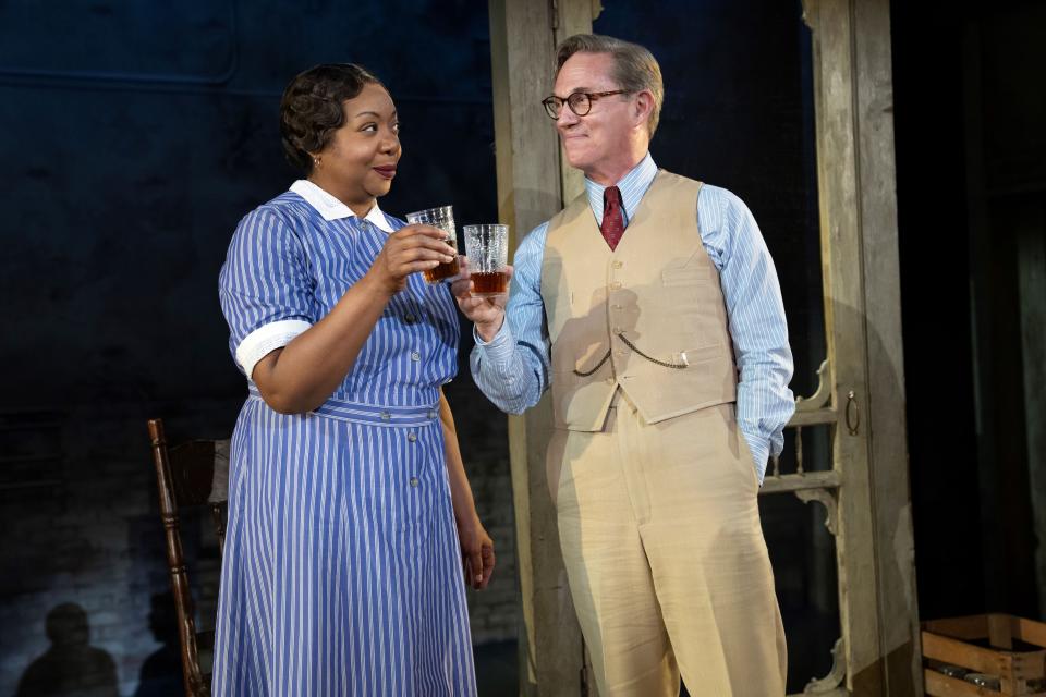 Jacqueline Williams and Richard Thomas drink tea in "To Kill a Mockingbird."