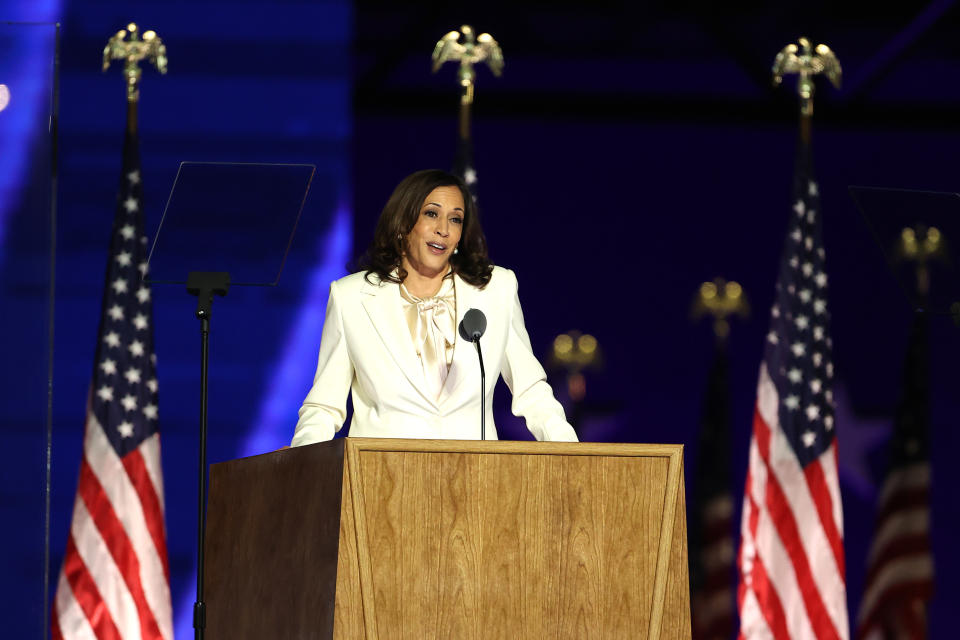 WILMINGTON, DELAWARE - NOVEMBER 07:  Vice President-elect Kamala Harris speaks on stage at the Chase Center before President-elect Joe Biden's address to the nation November 07, 2020 in Wilmington, Delaware. After four days of counting the high volume of mail-in ballots in key battleground states due to the coronavirus pandemic, the race was called for Biden after a contentious election battle against incumbent Republican President Donald Trump. (Photo by Tasos Katopodis/Getty Images)