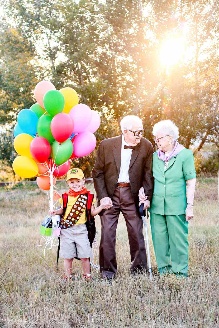 young boy with great grandparents dressed as UP characters