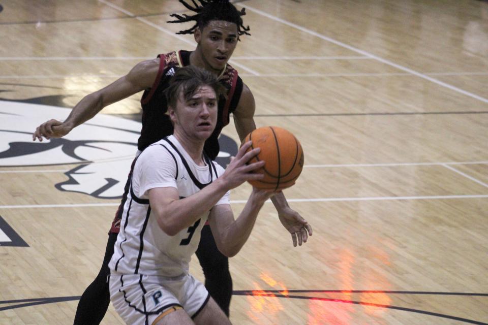 Providence guard Brady Patterson (3) prepares to shoot against Florida High during the teams' 2023 playoff.