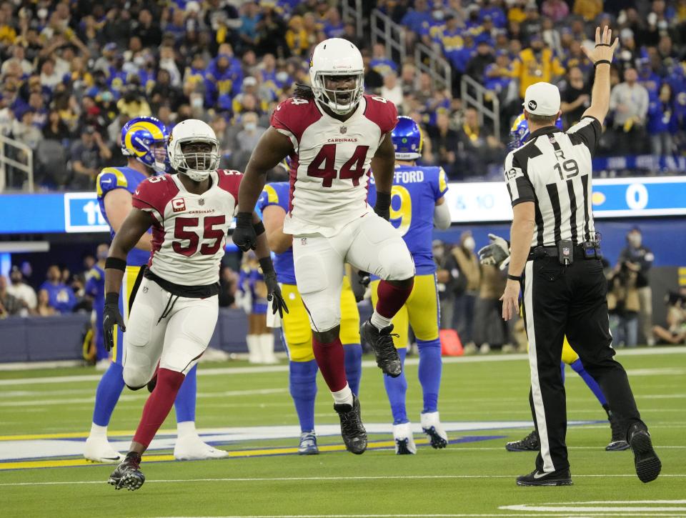 Jan 17, 2022; Los Angeles, California, USA;  Arizona Cardinals outside linebacker Markus Golden (44) celebrates after sacking Los Angeles Rams quarterback Matthew Stafford during the first quarter of the NFC Wild Card playoff game.