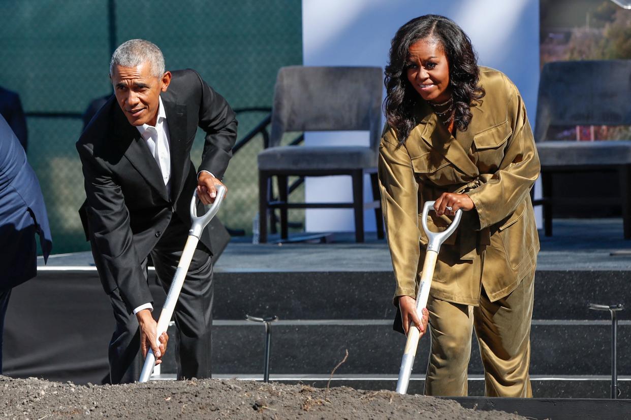 The Obamas (pictured at a groundbreaking ceremony for the Obama Presidential Center in Chicago in September) sent New Year wishes. (Photo: KAMIL KRZACZYNSKI/AFP via Getty Images)
