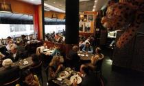 People lunch at Bar da Dona Onca restaurant in Sao Paulo April 24, 2014. REUTERS/Paulo Whitaker