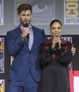 Chris Hemsworth, left, and Tessa Thompson speak during the "Thor Love And Thunder" portion of the Marvel Studios panel on day three of Comic-Con International on Saturday, July 20, 2019, in San Diego. (Photo by Chris Pizzello/Invision/AP)