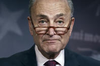 FILE - In this Monday, Dec. 9, 2019, file photo, Senate Minority Leader Chuck Schumer, D-N.Y., speaks to reporters on Capitol Hill in Washington. Senate Democrats are proposing a weekslong Senate impeachment trial seeking testimony from four new witnesses including John Bolton and Mick Mulvaney over President Donald Trump's actions toward Ukraine, according to a detailed outlined released Sunday, Dec. 15. Schumer proposed the structure for a “fair and honest’’ trial in a letter to Majority Leader Mitch McConnell. (AP Photo/J. Scott Applewhite, File)