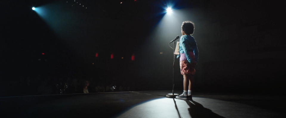 Monica as a kid competing in the National Spelling Bee