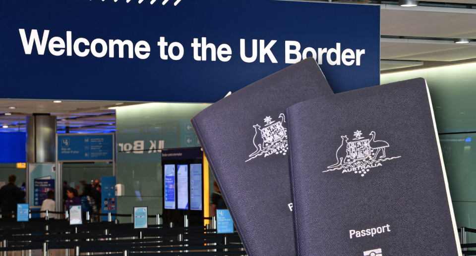 Welcome to the UK border sign with two Aussie passports in the foreground