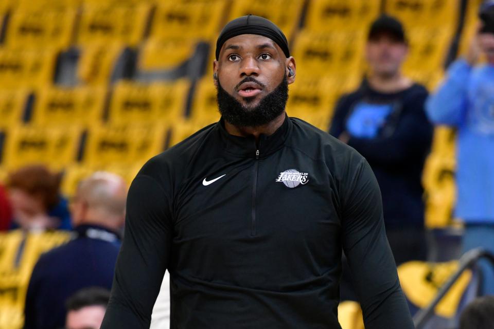 Los Angeles Lakers forward LeBron James warms up before Game 2 of a first-round NBA basketball playoff series against the Memphis Grizzlies Wednesday, April 19, 2023, in Memphis, Tenn. (AP Photo/Brandon Dill)