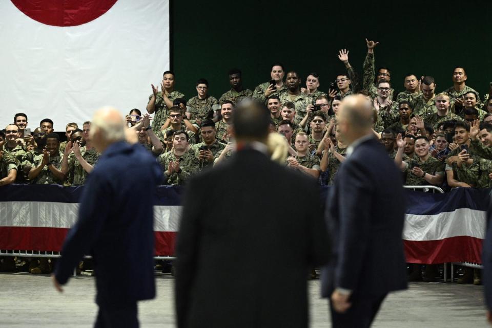 Joe Biden greeting US soldiers at the US Marine Corps base in Iwakuni (AFP via Getty Images)