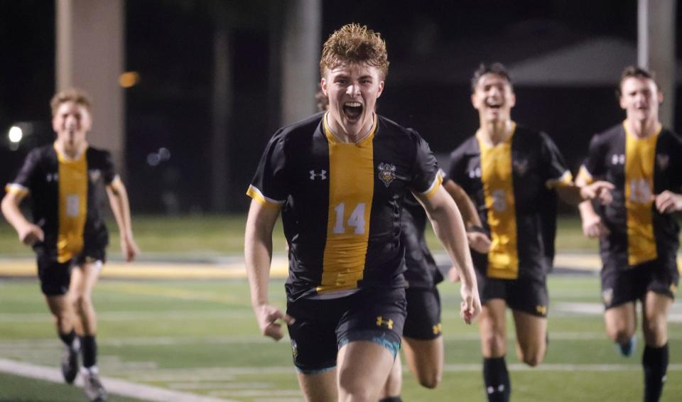 Verot player Ty Kolaczynski (#14) celebrates after scoring the game winning goal. The Bishop Verot boys soccer team defeated Canterbury School and won the Private 8 championship game with a final score of 2-1 Friday, January 19, 2024.