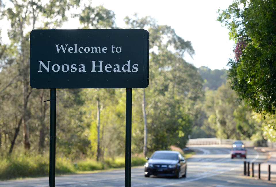 A wecome sign is seen on a road into the resort town of Noosa Heads where there is a proposed congestion tax.