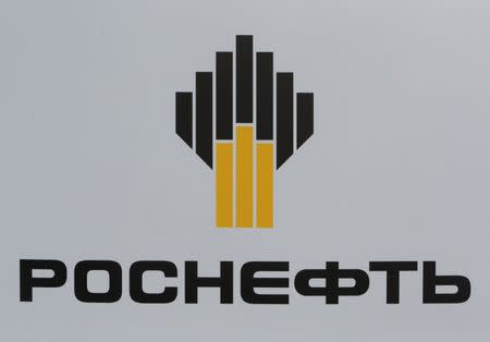 FILE PHOTO - The logo of Russia's oil producer Rosneft is seen on a board at the St. Petersburg International Economic Forum 2017 (SPIEF 2017) in St. Petersburg, Russia, June 1, 2017. Picture taken June 1, 2017. REUTERS/Sergei Karpukhin