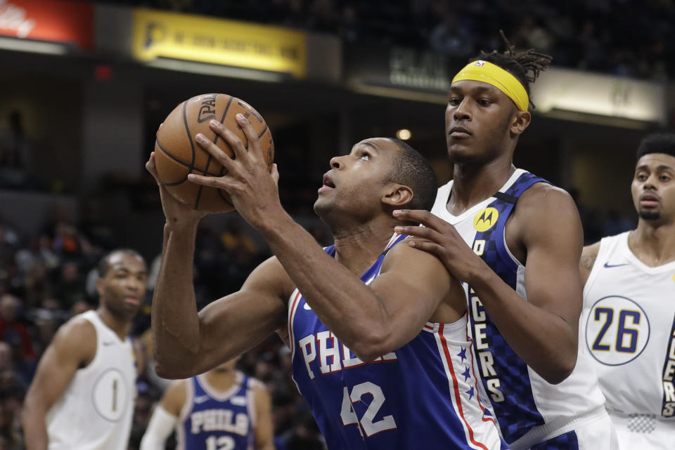 Philadelphia 76ers' Al Horford (42) goes up against Indiana Pacers' Myles Turner (33) during the second half of an NBA basketball game, Monday, Jan. 13, 2020, in Indianapolis. Indiana won 101-95. (AP Photo/Darron Cummings)