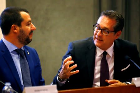 Austrian Vice-Chancellor Heinz Christian Strache speaks next to Italy's Interior Minister Matteo Salvini during a news conference at the Viminale in Rome, Italy, June 20, 2018. REUTERS/Stefano Rellandini