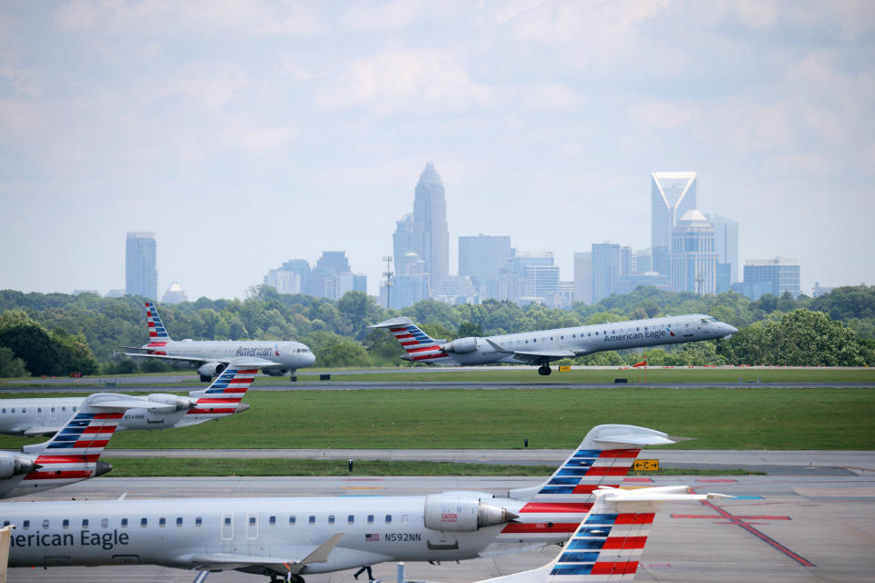 While airfare-dollar spending might fall somewhat because flight prices have come down, airports are reporting record traffic on key days. (Travis Dove/The New York Times)