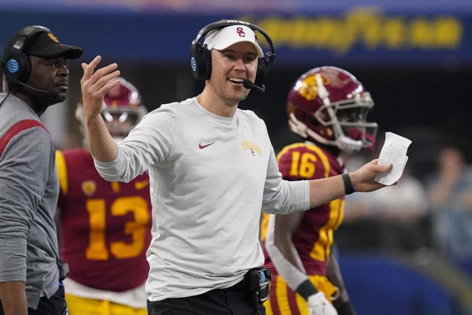 Southern California head coach Lincoln Riley gestures on the sideline during the second half of the Cotton Bowl NCAA college football game against Tulane, Monday, Jan. 2, 2023, in Arlington, Texas. (AP Photo/Sam Hodde)