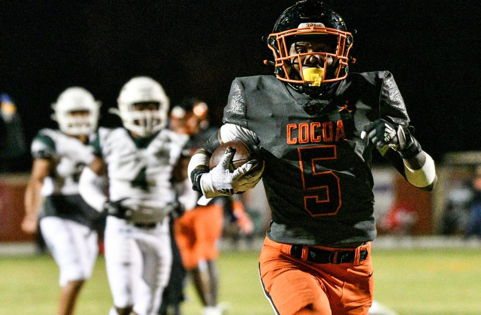 OJ Ross of Cocoa High runs 56 yards for a touchdown in the first quarter of the game against The Villages Charter Nov. 26, 2021. Craig Bailey/FLORIDA TODAY via USA TODAY NETWORK