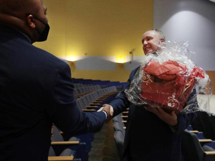 New Rock Hill Schools Superintendent Tommy Schmolze, right, shakes hands with South Pointe Assistant Principal Marek Marshall during a meet-and-greet.