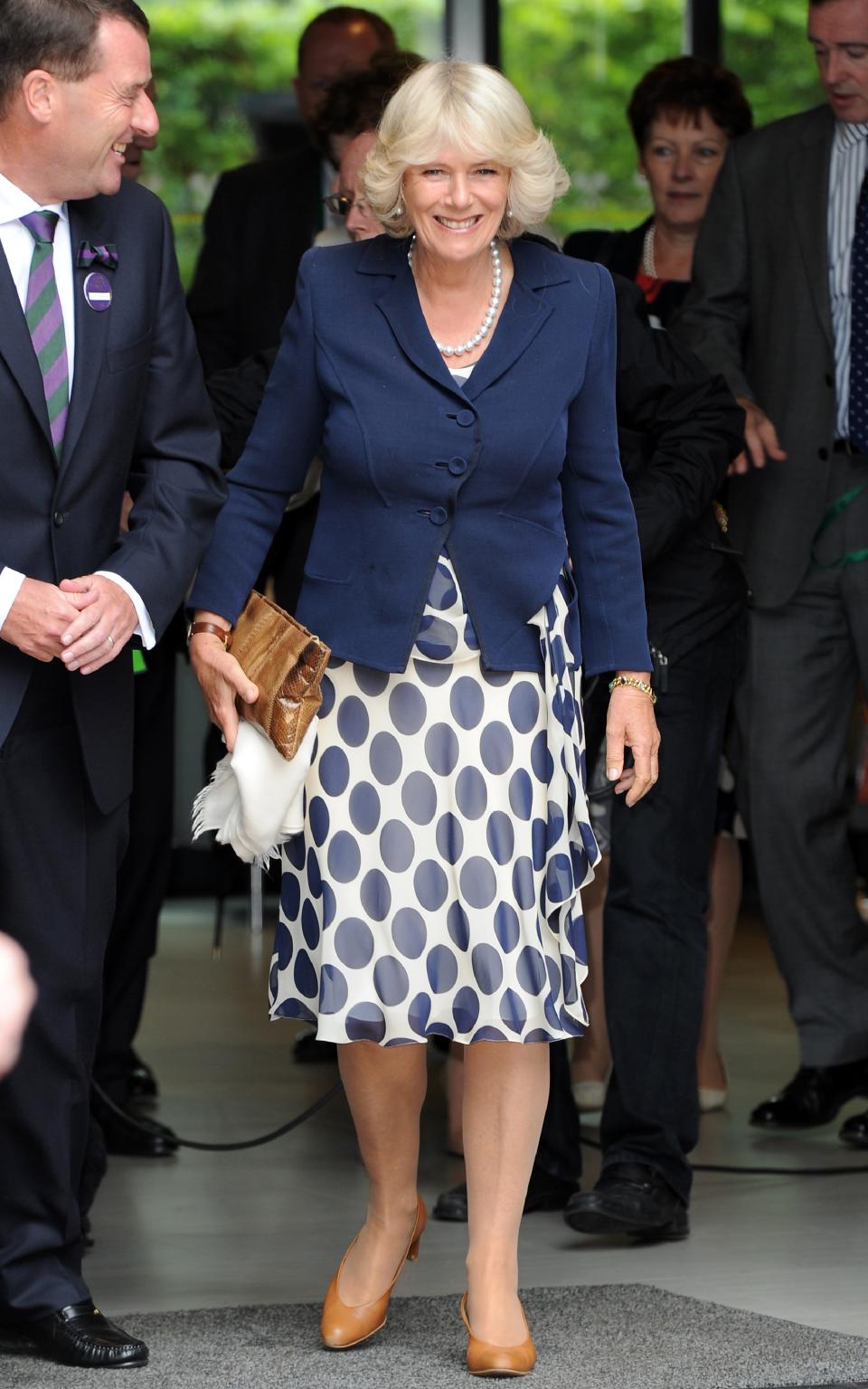 LONDON, ENGLAND - JUNE 22: Camilla, Duchess of Cornwall arrives to meet ball boys and girls during Day Three of the Wimbledon Lawn Tennis Championships at the All England Lawn Tennis and Croquet Club on June 22, 2011 in London, England. (Photo by Anthony Devlin/WPA Pool/Getty Images)