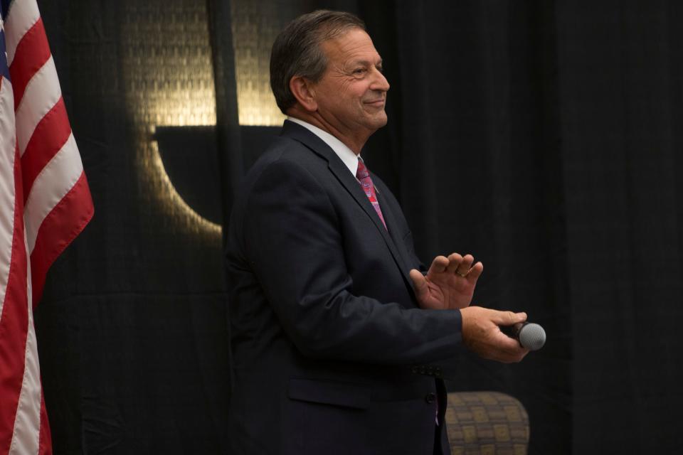 Gil Almquist, an incumbent member of the Washington County Commission running for reelection, speaks during a debate in May hosted by the Washington County Republican Party for local candidates ahead of the party's primary election.