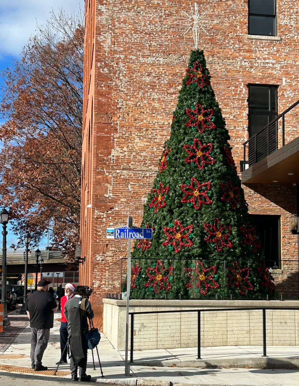 The annual Christmas tree goes up on the corner of Main and RailRoad St. in Utica.