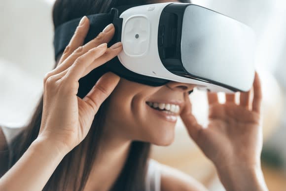 Woman wearing a VR headset.