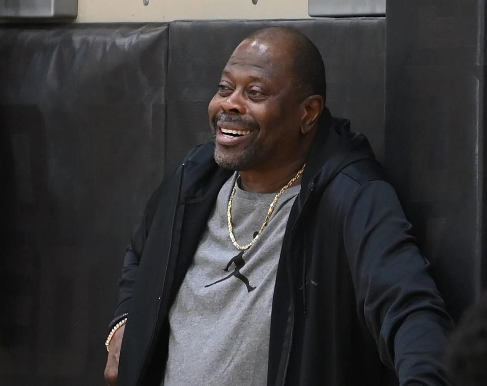 Former NBA and Hall of Fame member Patrick Ewing stands along a sideline at the end of the Charlotte Hornets practice at Spectrum Center in Charlotte, NC on Tuesday, October 3, 2023.