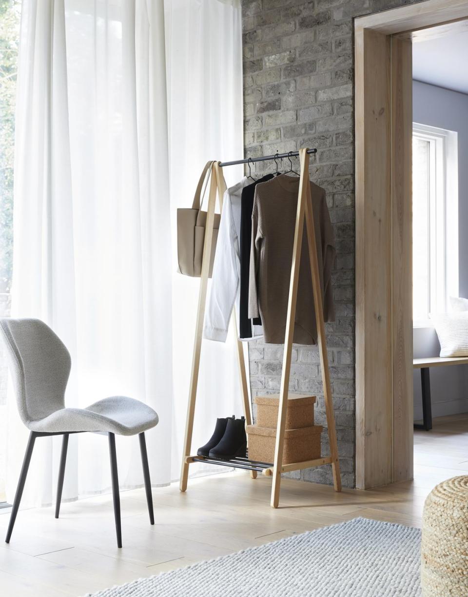 <p>Sustainable products are at the heart of Dunelm's new range, including this gorgeous clothes rail (£65) which has been made from ethically sourced wood. </p>