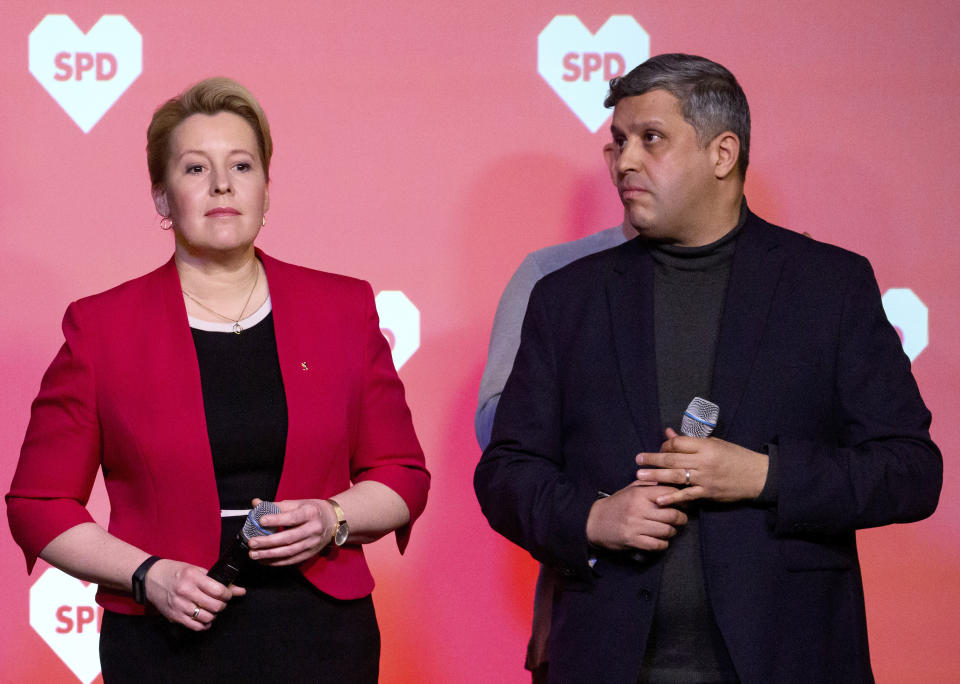 Berlin Mayor and top candidate of the Social Democratic Party (SPD), Franziska Giffey, left, and Raed Saleh, chairman of the state section of the SPD, react after the state elections in Berlin, Germany, Sunday, Feb. 12, 2023. The city of Berlin on Sunday, Feb. 12, 2023, holds a court-ordered rerun of a chaotic 2021 state election that was marred by severe glitches at many polling stations. (Bernd von Jutrczenka/dpa via AP)