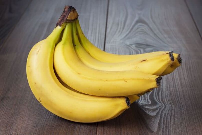 fresh bananas on the brown table