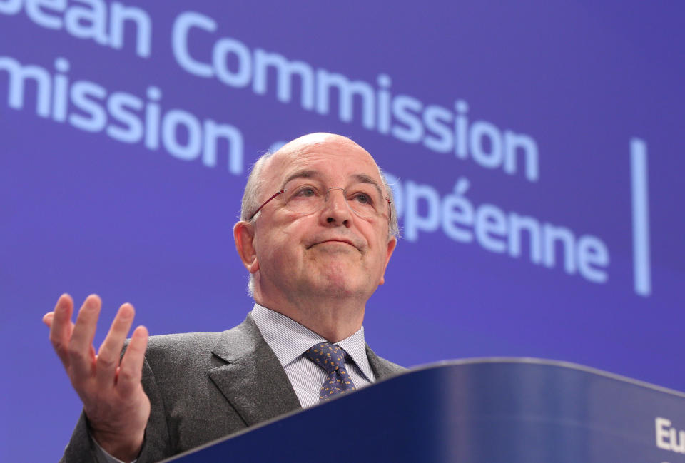 European Commissioner for Competition Joaquin Almunia addresses the media, at the European Commission headquarters in Brussels, Wednesday, Feb. 5, 2014. The European Union's antitrust watchdog says Google is offering new and far-reaching concessions to address allegations it is abusing its dominant position in Internet searches. The EU's executive said Wednesday that Google guarantees it will display results from three competitors in a similar way whenever it promotes its own specialized search services like Google shopping. (AP Photo/Yves Logghe)