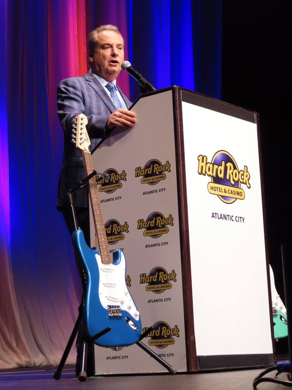 Jim Allen, chairman of Hard Rock International, speaks at an employee meeting at the Hard Rock casino in Atlantic City, N.J., on Feb. 17, 2022. On Monday, June 6, 2022, Allen said he spoke recently with New Jersey Gov. Phil Murphy about a proposed ban on smoking in Atlantic City casinos, but says he was not out to change the governor's mind. (AP Photo/Wayne Parry)