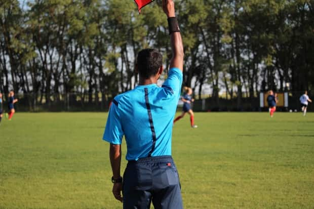 The Alberta Soccer Association would typically register around 2,400 referees, according to its executive director. (Submitted by Alberta Soccer Association - image credit)