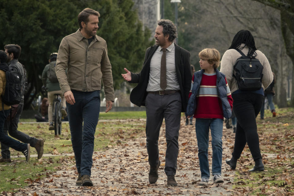 The Adam Project (L to R) Ryan Reynolds as Big Adam, Mark Ruffalo as Louis Reed and Walker Scobell as Young Adam. (Doana Gregory/Netflix)