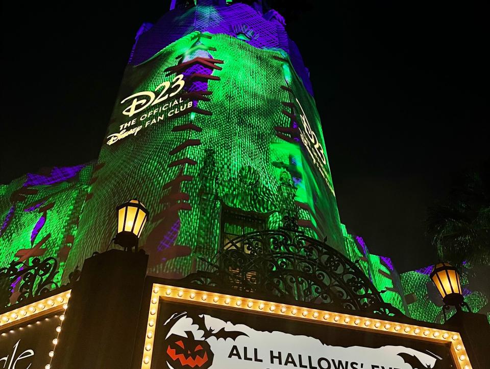 halloween projections on carthay's circle bell tower at oogie boogie bash