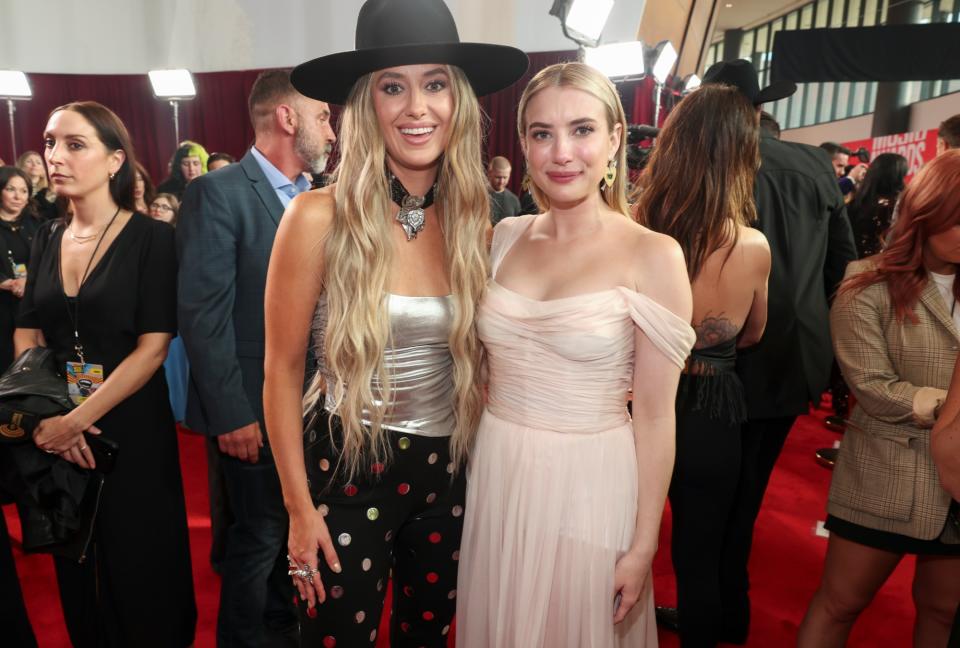 Laney Wilson and Emma Roberts at the 2024 CMT Music Awards held at the Moody Center on April 7, 2024 in Austin, Texas.