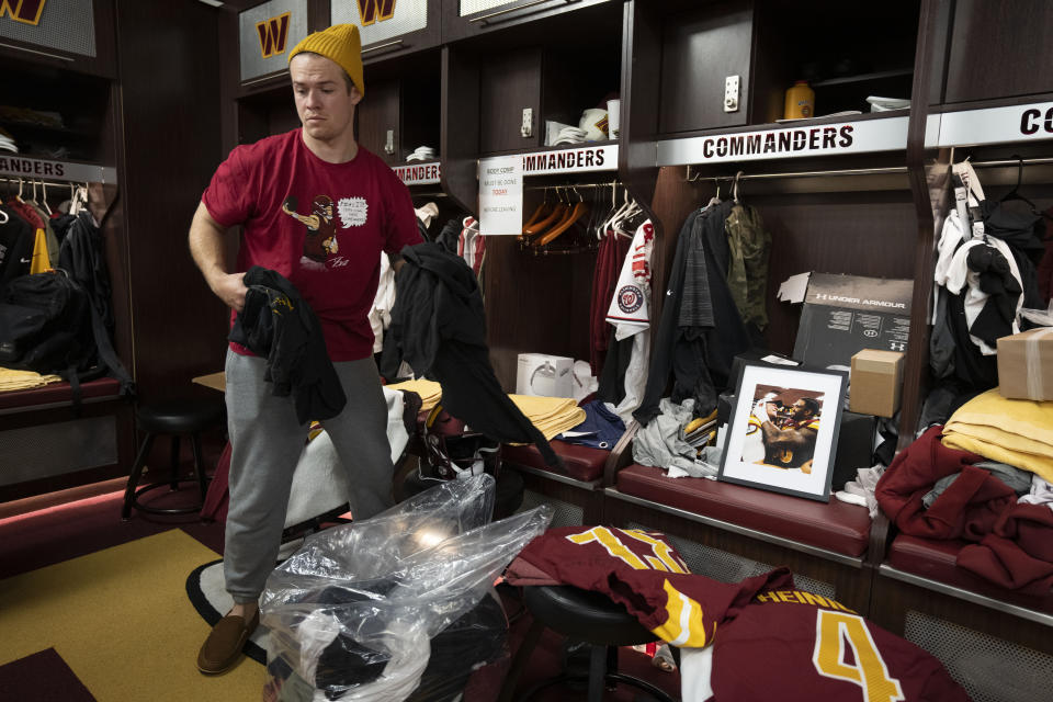 Washington Commanders quarterback Taylor Heinicke packs his personal belongings from his locker during the NFL football team's open locker room event in Ashburn, Va., Monday, Jan. 9, 2023. The Commanders ended another season stuck in the middle of mediocrity at 8-8-1. (AP Photo/Manuel Balce Ceneta)