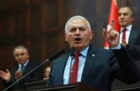 Turkish Prime Minister and leader of the ruling Justice and Development Party (AK Party), Binali Yildirim, speaks in Ankara on July 19, 2016