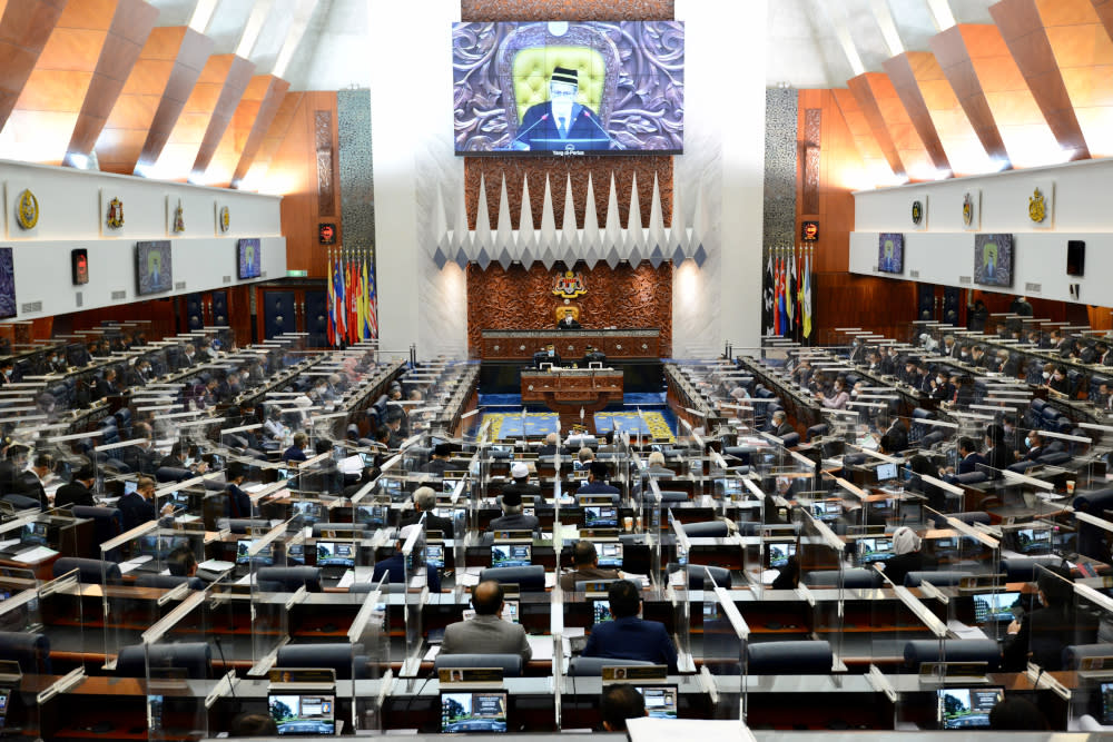 Members of Malaysia’s parliament attend a session of the lower house of parliament, in Kuala Lumpur, Malaysia July 26, 2021. — Malaysia Information Department/Nazri Rapaai handout pic via Reuters