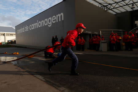 Members of firefighter school attend a training session in Oliveira do Hospital, Portugal November 10, 2018. Picture taken November 10, 2018. REUTERS/Rafael Marchante