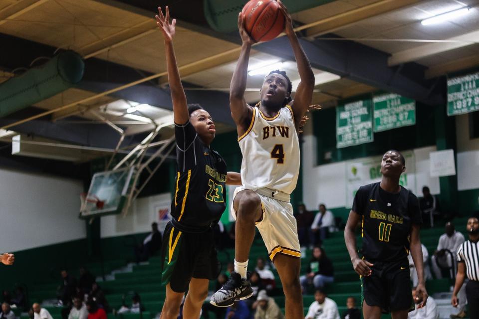 BTW's Rotrayvious Brooks goes up for two points against Green Oaks in the 2024 Bossier Invitational. Brooks is considered an unsung hero of his team per his coach.