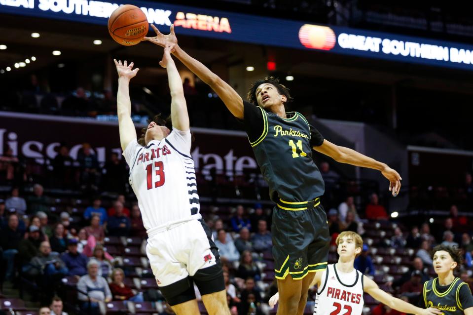 Parkview's Elias Govan reaches for a rebound as the Vikings take on the Branson Pirates in the Gold Division of the Blue & Gold Tournament at Great Southern Bank Arena on Monday, Dec. 26, 2022.