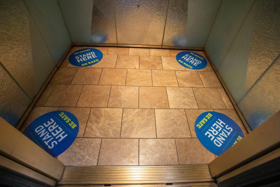 Stickers mark where guest should stand to maintain proper social distancing inside elevators on May 21, 2020, in Uncasville,  Connecticut.