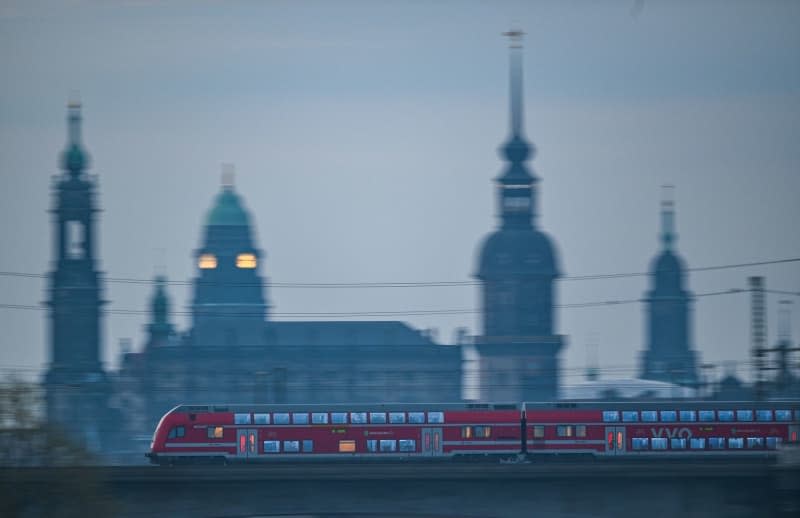 Spontaneous trips to random places you've never visited before: This approach to travel becomes more feasible when you have unlimited rail travel, like with Germany's €49 monthly ticket. Robert Michael/dpa