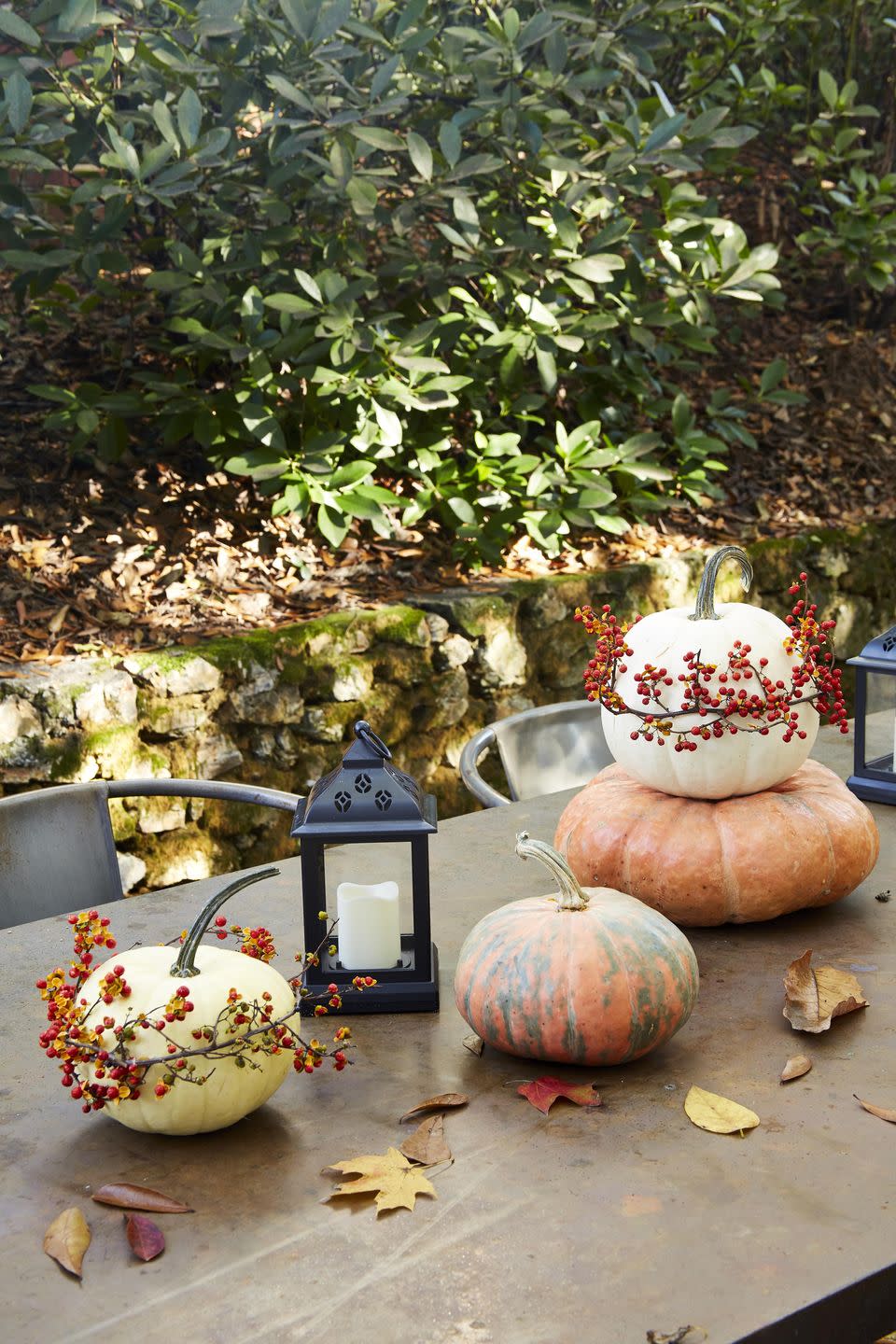 <p>This simple craft, which is perfect for decorating your fall table or front porch, only takes three supplies and just a few minutes to make. If you can’t find bittersweet vine, try using grapevine and attaching berries with hot glue.</p><p><strong>To make: </strong>Wrap white pumpkins with bittersweet vine, holding it in place with t-pins and hot glue.</p>