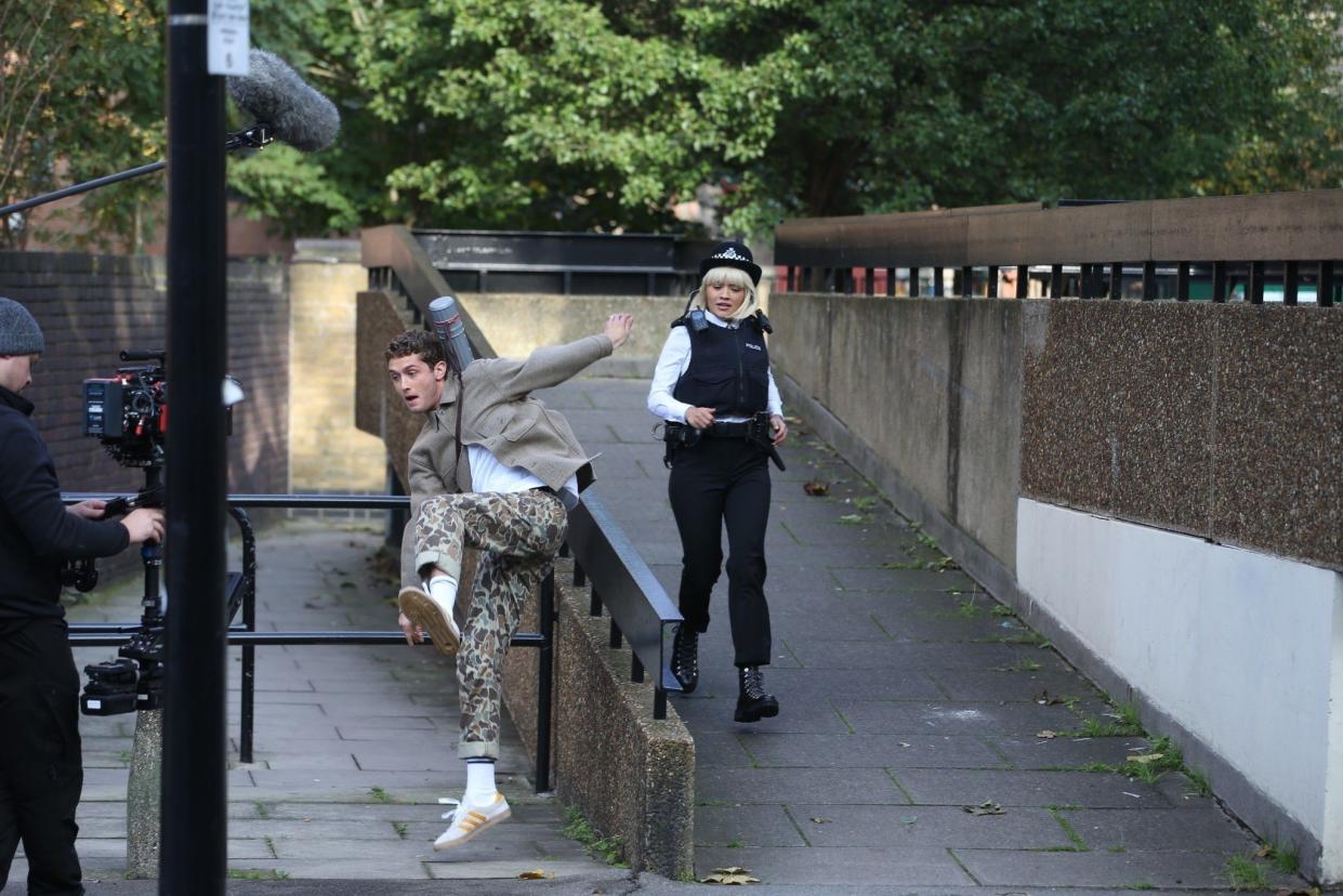 Rita Ora and Jude Law's son Rafferty are seen on set of the new Oliver Twist remake while filming an action scene on Oct. 22, 2019, in London. Ora is playing Dodge while Law is playing the lead character, Oliver.